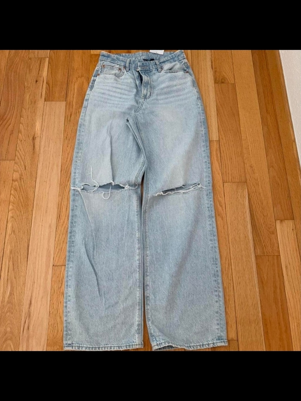 Light Wash Distressed High-Rise Wide Leg Women’s Jeans